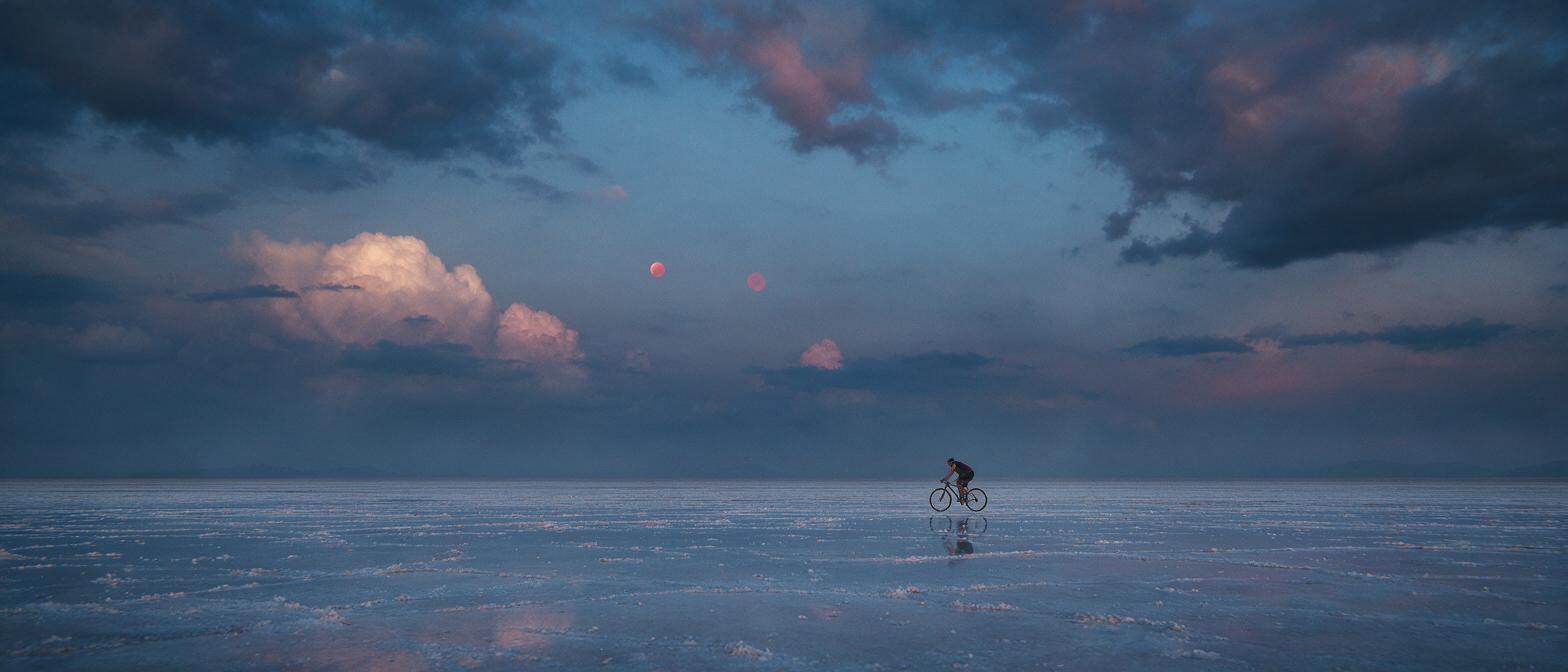 Seedream 5.0 Pro cinematic cyclist crossing a reflective salt flat